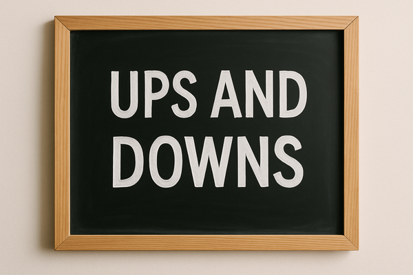 show ups and down written on a board