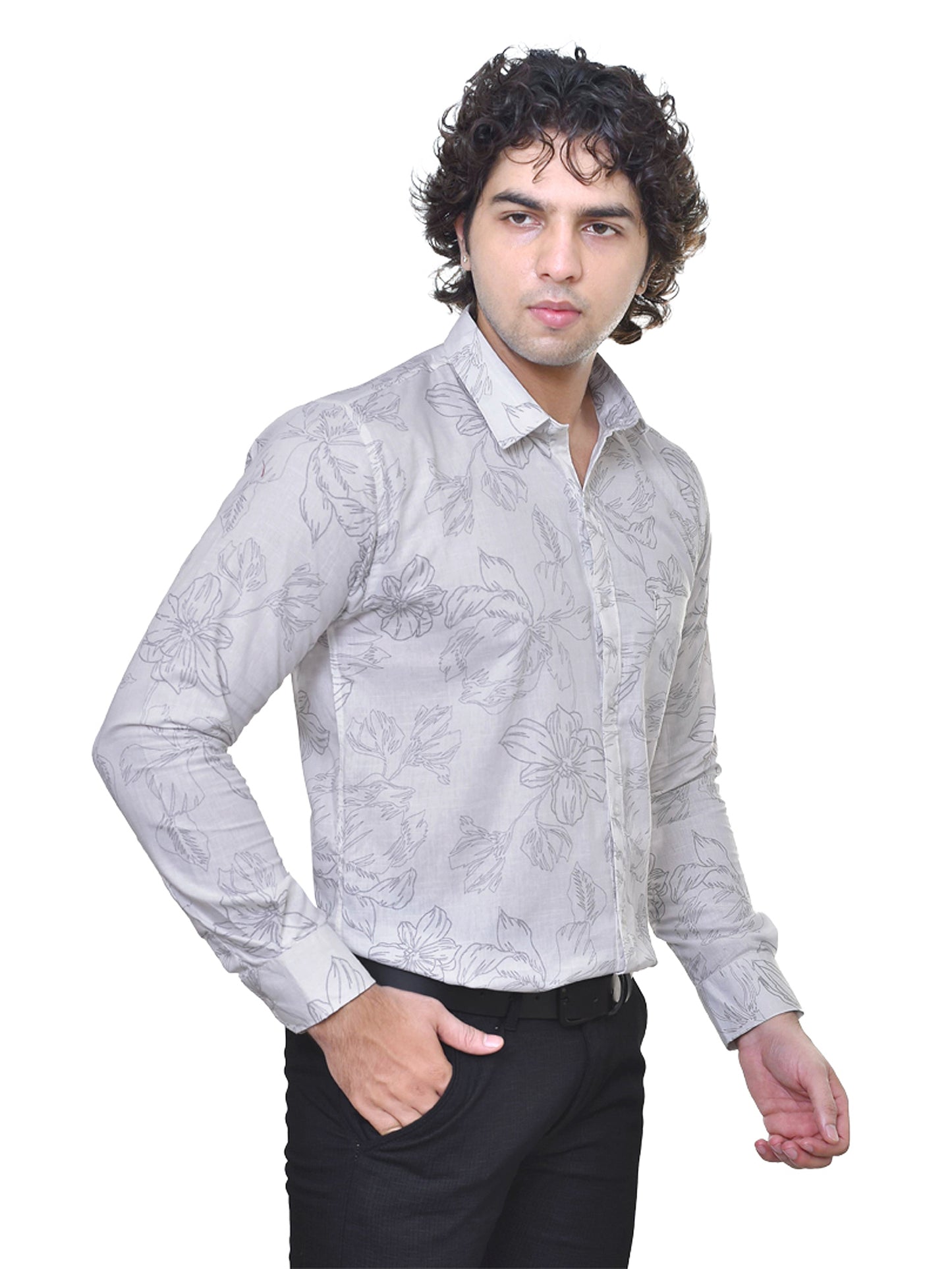 Man wearing a white patterned shirt on a white background