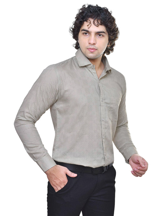 Man wearing a sage green shirt on a white background