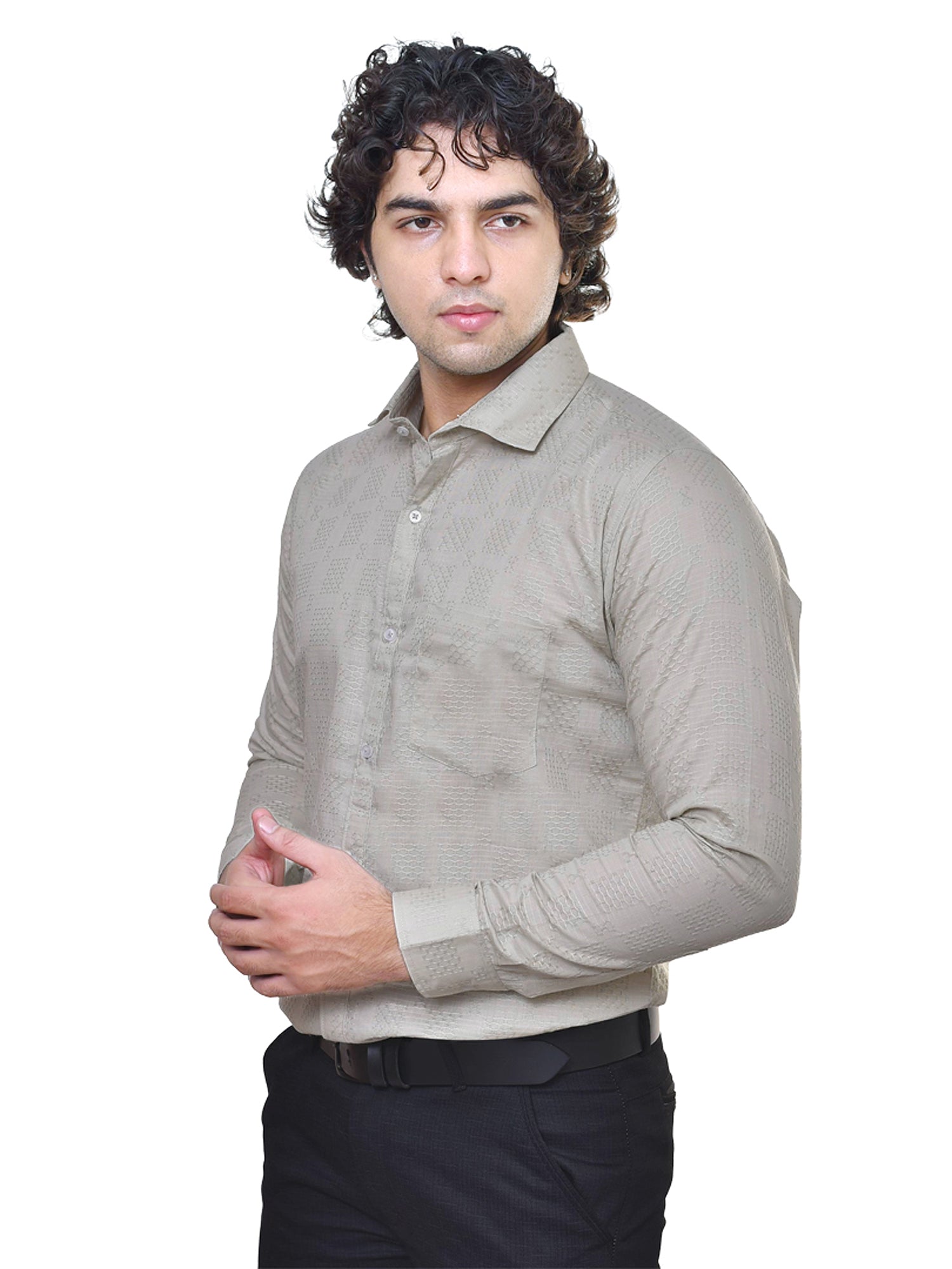 Man wearing a sage green shirt on a white background