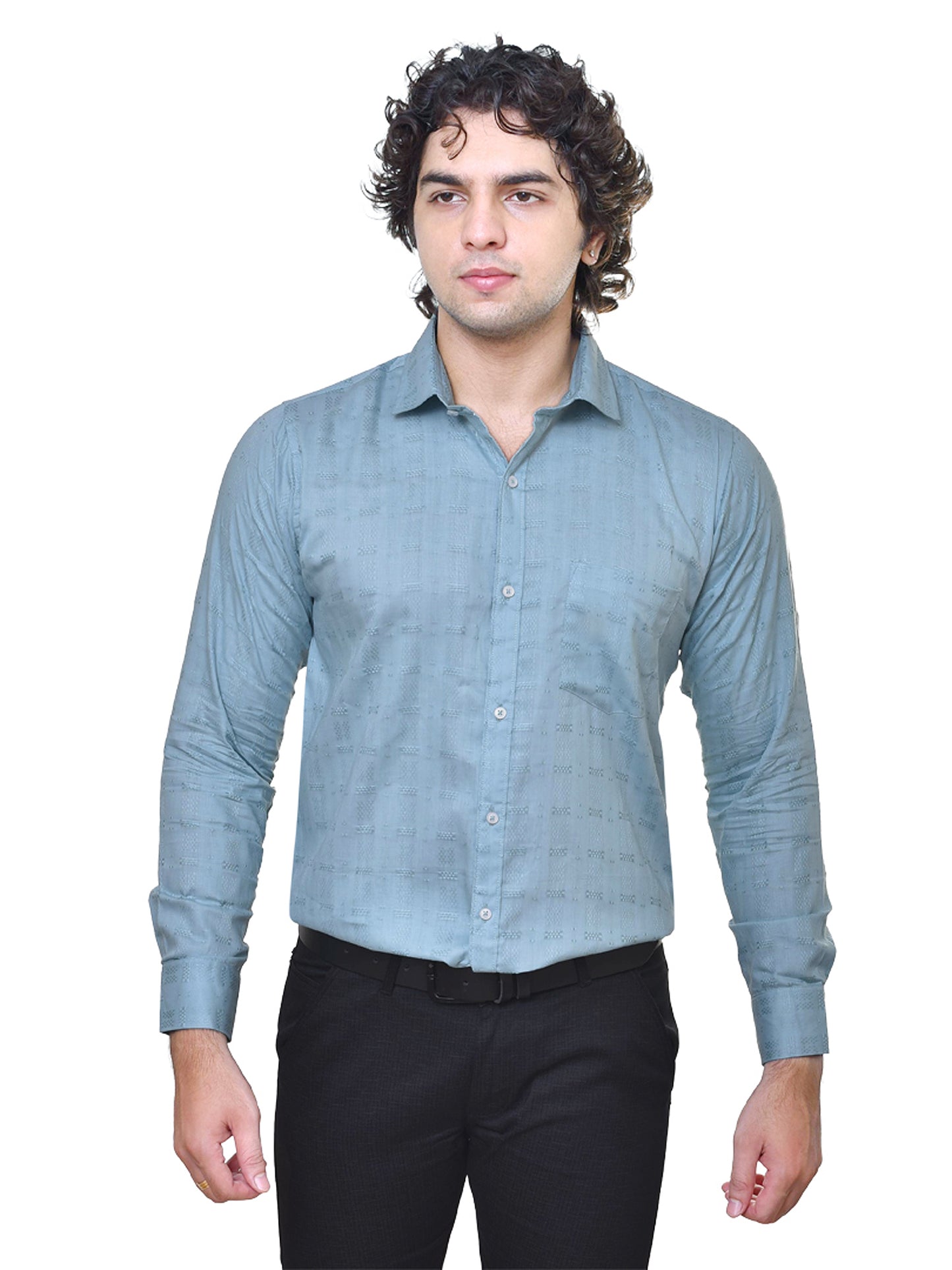 Man wearing a light blue dobby shirt and black pants on a white background