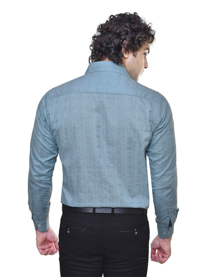 Man wearing a light blue shirt with a white background